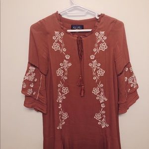 Rose colored bohemian dress with white floral